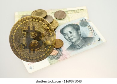 Real Cryptocurrency Coins On Chinese Yuan Bills - Crypto Currency In China Concept