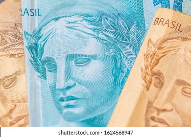 Real Currency. Money From Brazil. Brasil, Dinheiro, Reais. Fifty Reais And One Hundred Reais Banknotes With Foc