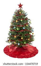 Real Decorated Christmas Tree With Skirt, Garland, Ornaments And Star Isolated On White