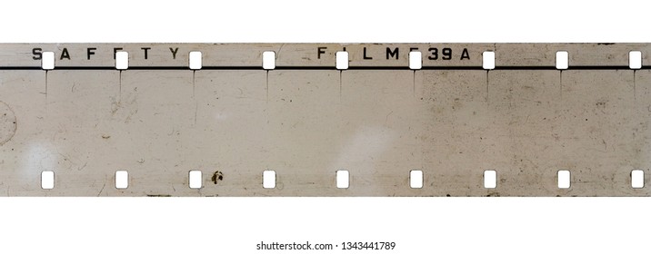 real detail shot of 16mm film strip on white background, cine film macro photo