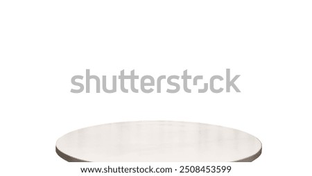 real empty beige round marble table isolated on background with clipping path. round pedestal podium used for montage image for premium, luxury, deluxe products.