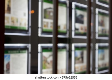 Real Estate Agency Window Display At Night In London, UK