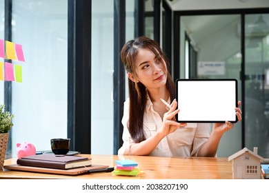 Real Estate Agent Female Showing Digital Tablet With Empty Display. 