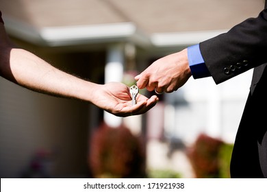 Real Estate: Agent Gives Keys To Buyer - Shutterstock ID 171921938