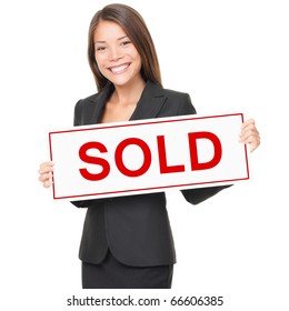 Real Estate Agent Holding Sold Sign Isolated On White Background. Beautiful Cheerful Asian / Caucasian Female Realtor Smiling Confident In Black Suit.