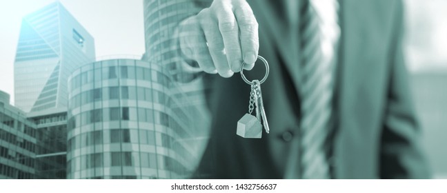 Real Estate Agent Offering House Keys; Multiple Exposure