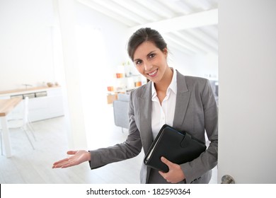 Real Estate Agent Ready To Present House To Client