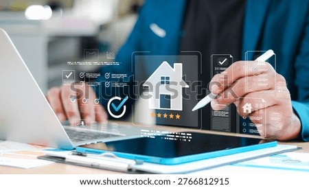 Real estate agent using tablet and laptop with digital house rating interface and checklist overlay. Concept of property evaluation, online reviews, smart home buying, and PropTech.