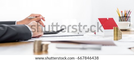 Real estate agent working at the table - panoramic banner