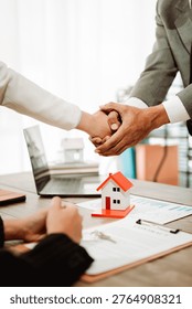Real estate agents present model homes to clients, arrange mortgage loan agreements, and handle home purchase agreements. (Context: Concepts related to home mortgage loans.)