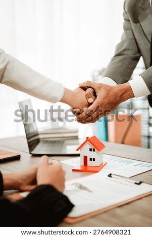 Real estate agents present model homes to clients, arrange mortgage loan agreements, and handle home purchase agreements. (Context: Concepts related to home mortgage loans.)