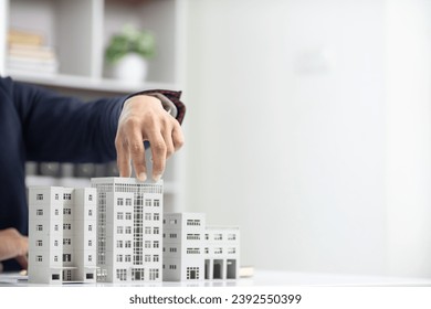Real estate agents are selling real estate clients and offering condominiums buyers as long term rental investments help reduce burden paying installments. Investment property trading long term rental