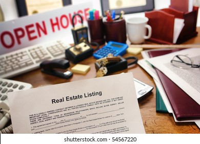 Real Estate Broker Listing Contract Over Busy Realtor Desk In Realty Agent Resale Office (fictitious Document With Authentic Legal Language)
