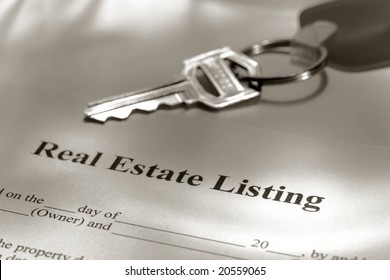 Real Estate Broker Residential House Sale Listing Contract Paperwork And Key On A Realtor Desk