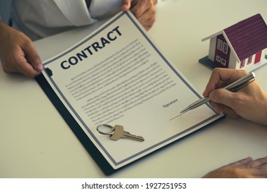 Real estate brokerage agent Contract, agreement, home insurance concept Making lease and buying a house