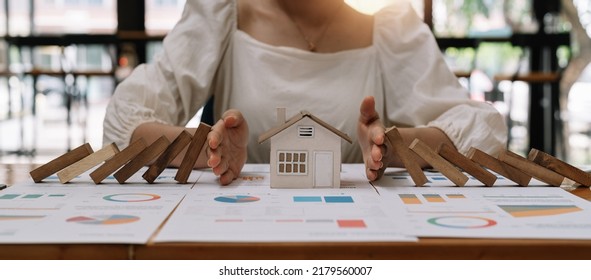 Real Estate House Insurance. Domino Chain Challenge And Risk Protection - Powered by Shutterstock