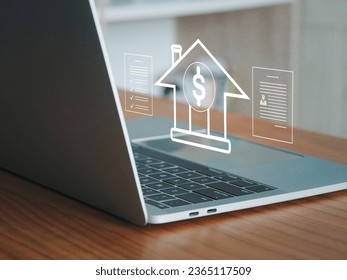 Real estate investment, businessman or online house broker reviewing real estate transaction documents to make a profit in the future on the screen like real digital - Shutterstock ID 2365117509