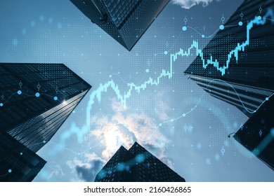Real estate and investment concept with bottom view on sunny skyscrapers tops and digital financial chart with stock market diagram