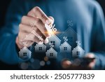 Real estate investment concept. Businessman with house icon and percentage symbol for analyzing mortgage loan home and insurance real property mortgage. interest rate, Investment planning.