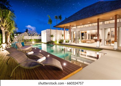 real estate Luxury Interior and exterior design  pool villa with living room  at  night sky  home, house ,sun bed ,sofa