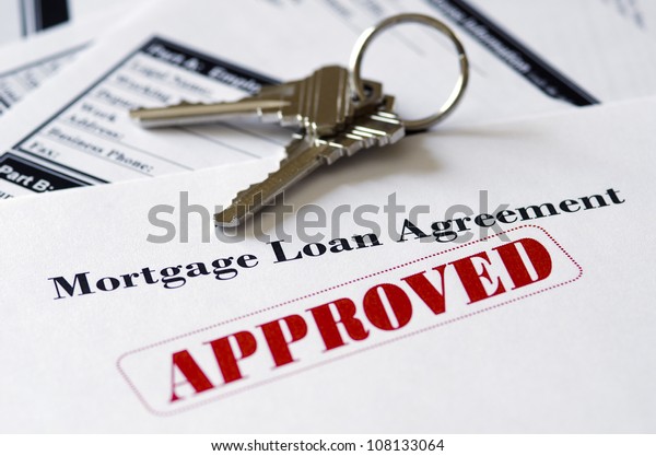 Real Estate Mortgage Approved Loan Document With House Keys