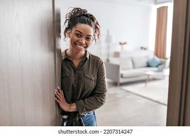 Real Estate Offer. Happy Black Lady Opening Door Smiling To Camera Meeting You At Home. Welcome To My New House, Smiling To Camera. Apartment Ownership And Purchase Concept