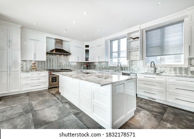 Real estate photography - Kitchen, bathrooms and rooms of the interior of the Big Luxury staged and furnished house in Montreal with swimming pool, BBQ and backyard