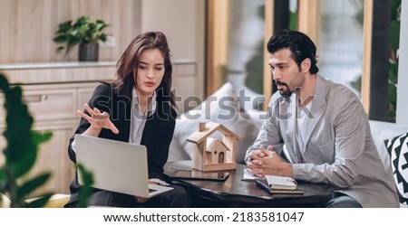 real estate sale agent discussion in office