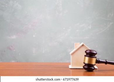 Real Estate Sale Auction Concept - Gavel And House Model