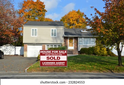 Real Estate Sold (another Success Let Us Help You Buy Sell Your Next Home) Sign Suburban High Ranch Home Autumn Day Residential Neighborhood Blue Sky Clouds USA