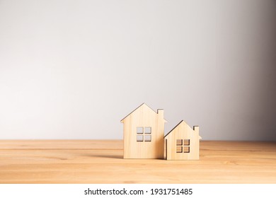 real estate, wooden house models on table