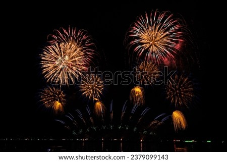 Real Fireworks at Pattaya bay, Pattaya national Fireworks Festival contest, November of every Year, Beautiful of bright light fireworks Show in middle sea, for postcard wallpaper background photo,