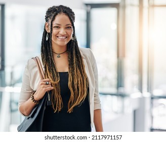 I'm A Real Go Getter. Cropped Portrait Of An Attractive Young Female Designer Standing In Her Office.