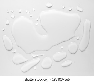 real image, top view spilled water drop on the floor isolated on white background
