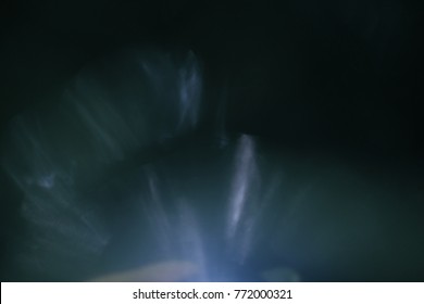 Real Lens flare light effect. Sparkle ray leak on black background. Optical effect of spotlight. Flash leak beam. - Shutterstock ID 772000321