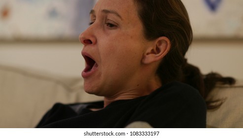 Real Life Candid Yawn. Woman Yawning Casually Late At Night