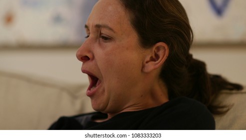 Real Life Candid Yawn. Woman Yawning Casually Late At Night