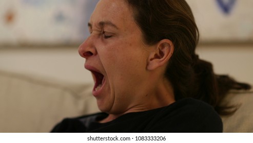 Real Life Candid Yawn. Woman Yawning Casually Late At Night