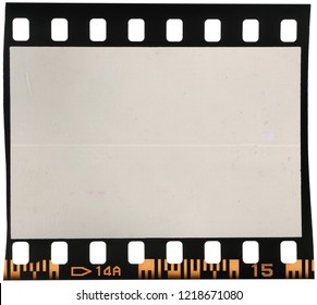 Real Macro Photo Of 35mm Dia Film Frame Or Strip On White With Signs Of Usage, Dust And Film Grain