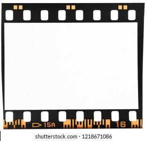 Real Macro Photo Of 35mm Dia Film Frame Or Strip On White With Signs Of Usage, Dust And Film Grain