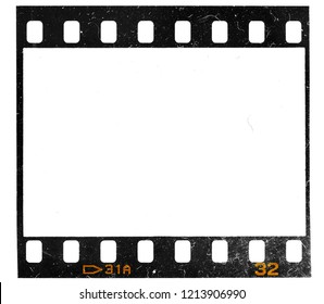 Real macro photo of 35mm film frame or dia strip on white with signs of usage, dust or dirt