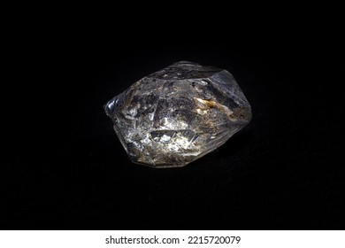 Real Natural Shaped Double-terminated Clear Quartz Herkimer Diamond Crystal Macro Isolated On A Black Surface Background  