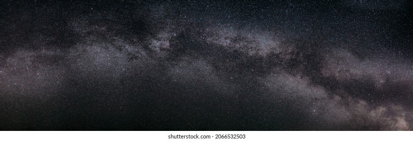 Real Night Sky Stars With Milky Way Galaxy. Natural Starry Sky Background. Panorama Panoramic View.