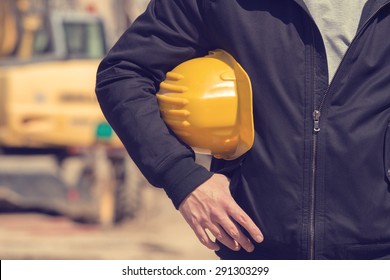 Real And Ordinary Construction Worker On His Job.