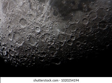 real picture of the moon surface taken by telescope, illustrates how cratered is the south side of it