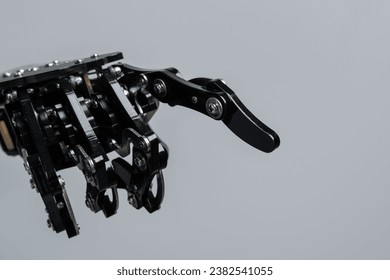 Real robot's hand pointing or pushing on something. Concepts of AI development and robotic process automation. - Powered by Shutterstock