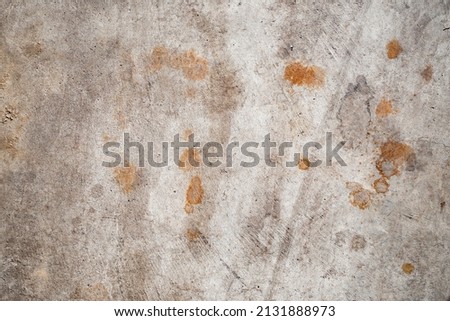 Real Rough Grey Grunge Concrete Rock Wall Backdrop Texture with Orange Rust Stains