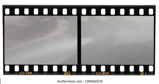 real scan of 35mm film strip or film material isolated on white background, just blend in your own content to make it look old and vintage