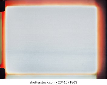 real scan of empty or overexposed 8mm film, cool film photoplaceholder frame with light leaks.