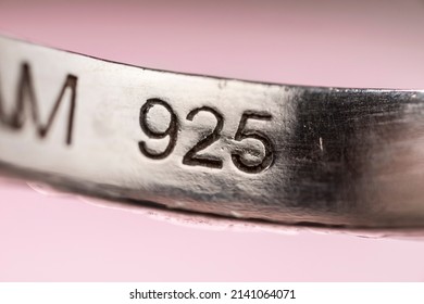 Real silver stamp, 925 number mark on a real silver ring, indicating the purity of the precious metal in the jewellery. Detail macro shot